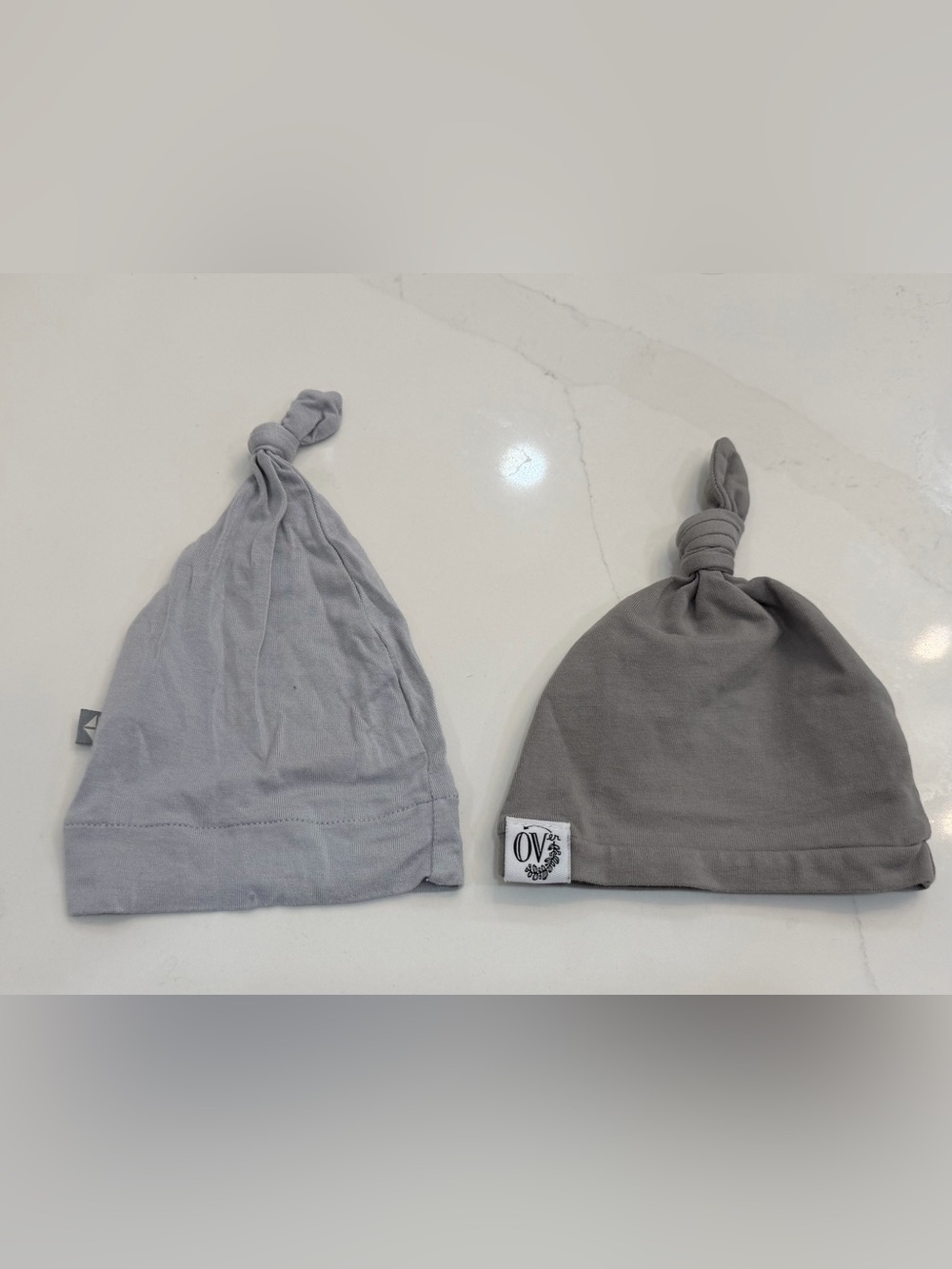 Kyte baby and Over Grey Knotted Baby hats. Newborn.